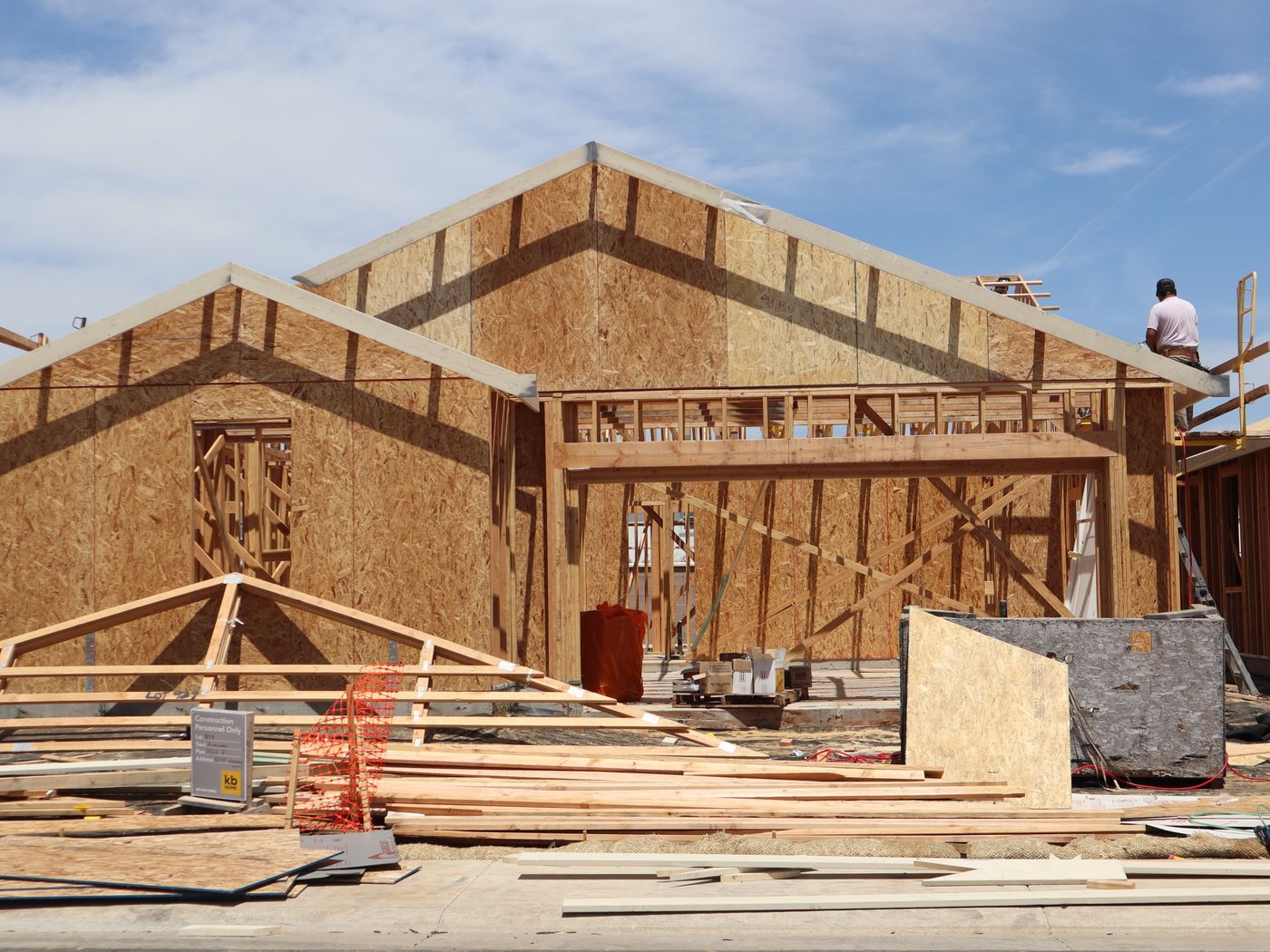 A roof mid tear-off with underlayment exposed