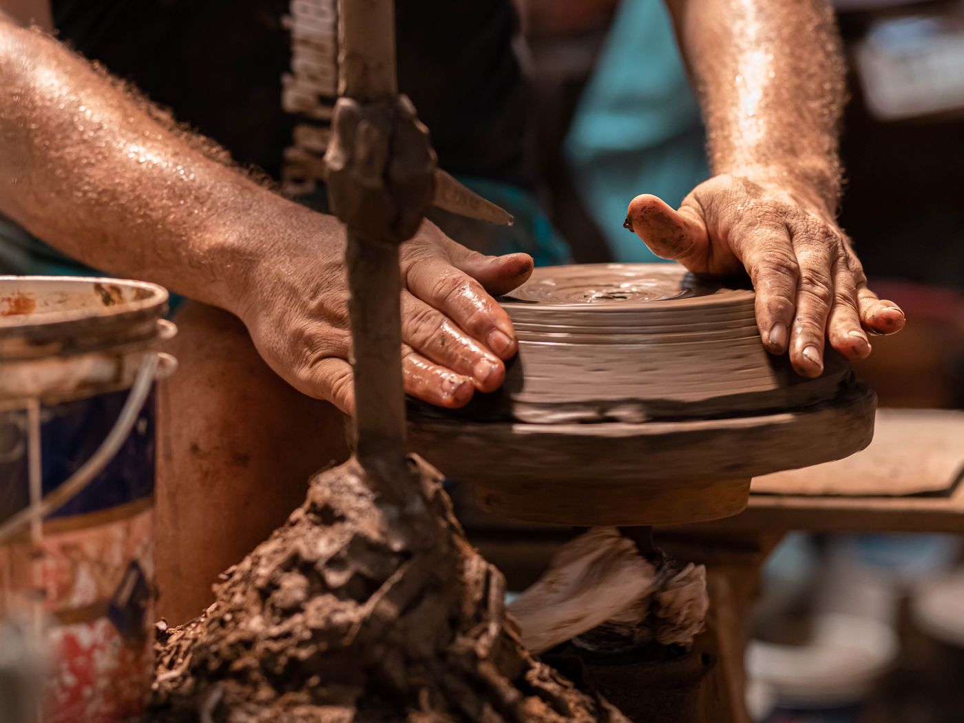 A craftsperson's hands at work